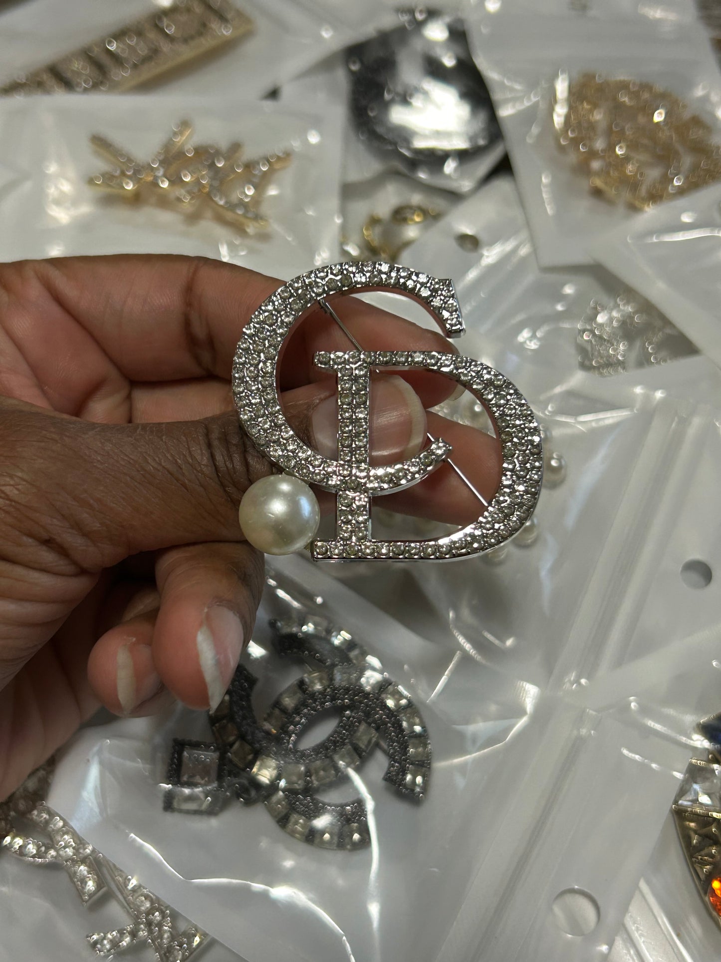 $20+ Luxe Line Brooches