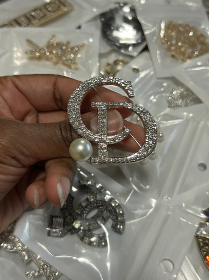 $20+ Luxe Line Brooches