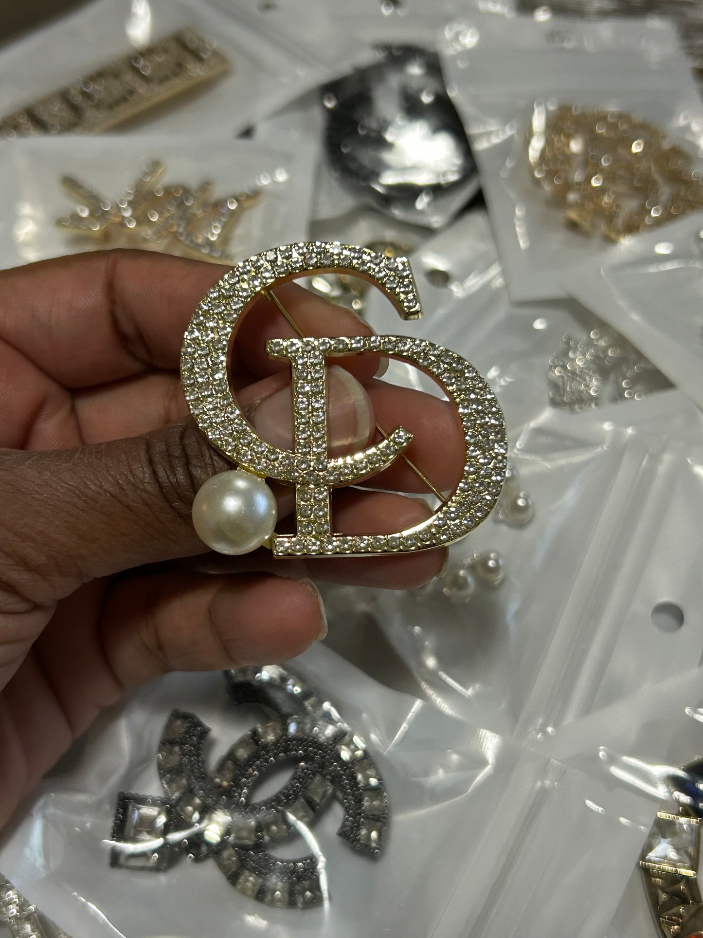 $20+ Luxe Line Brooches